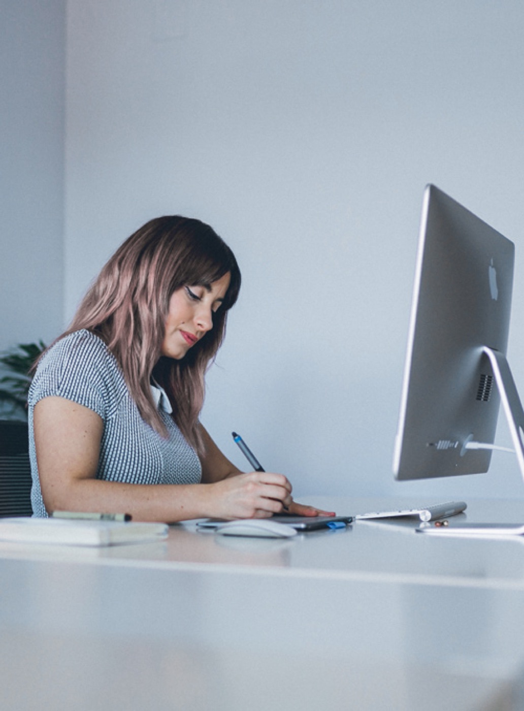 Silvia working at her desk